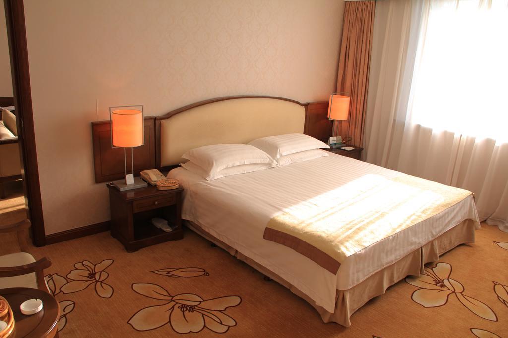 Harbin Victories Hotel Habitación foto