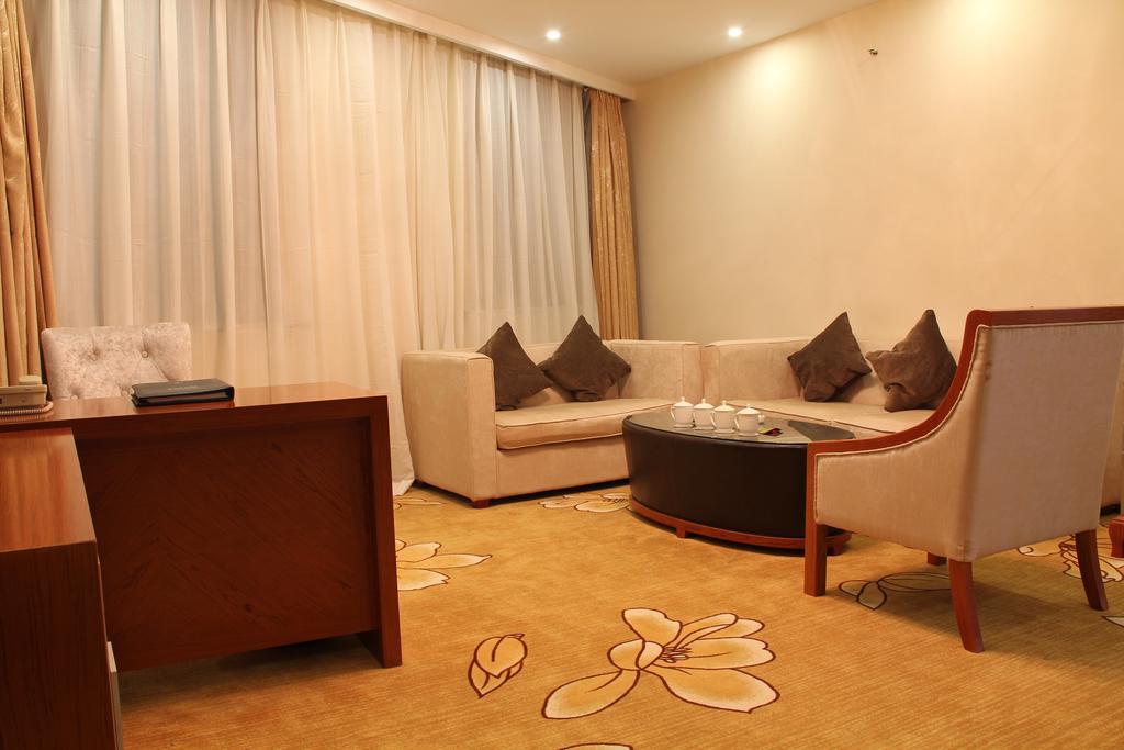 Harbin Victories Hotel Habitación foto